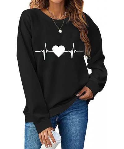 Valentine's Day Shirts for Women Love Heart Graphic Pullover Long Sleeve Casual Loose Sweatshirts Trendy Crewneck Top A24 $8....