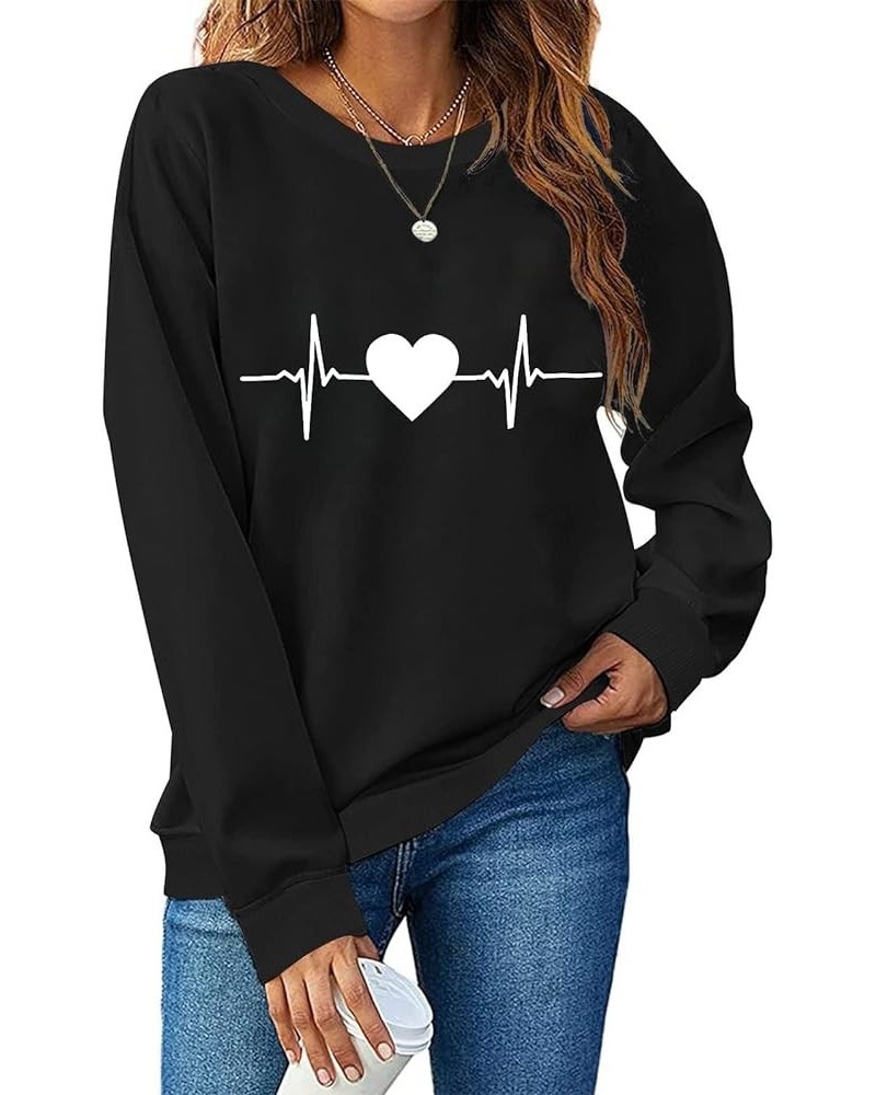 Valentine's Day Shirts for Women Love Heart Graphic Pullover Long Sleeve Casual Loose Sweatshirts Trendy Crewneck Top A24 $8....