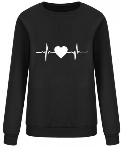 Valentine's Day Shirts for Women Love Heart Graphic Pullover Long Sleeve Casual Loose Sweatshirts Trendy Crewneck Top A24 $8....